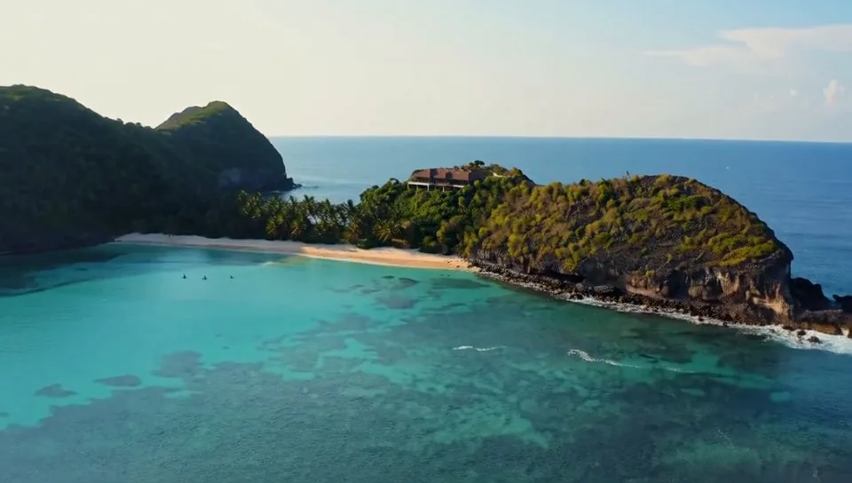 First frame of the clip: Secret tropical paradise travel reel